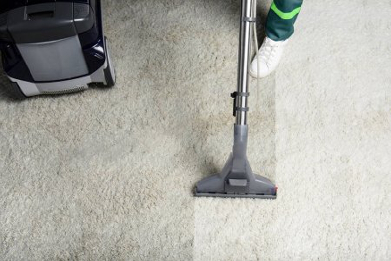 Performing carpet cleaning services