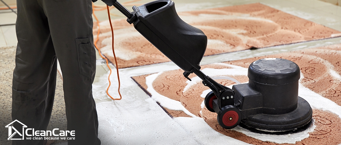 office carpet cleaning services man using cleaning tool