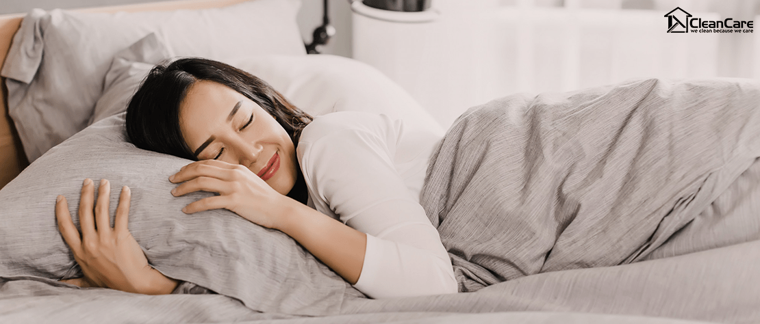 Woman sleeping peacefully with her freshly cleaned mattress