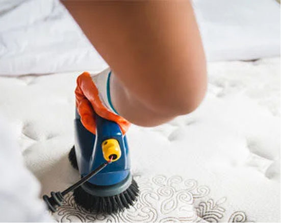 High-pressure scrubbing for mattress cleaning