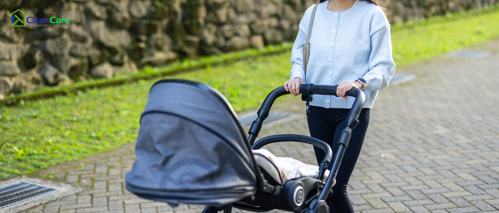 Parents pushing a stroller, highlighting cleanliness needs.